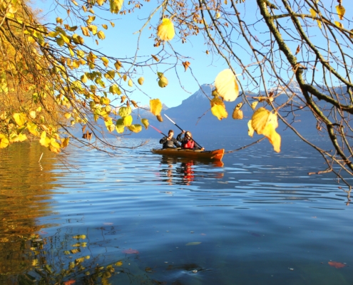 Kayakers on a serene lake